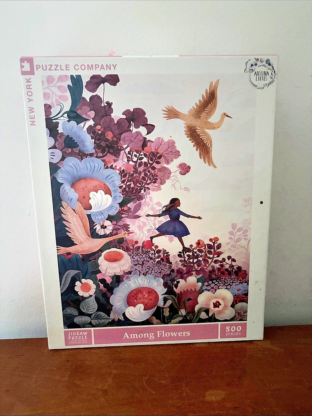 Among Flowers 500-Piece Floral Puzzle New York Puzzle Company Adelina Lirius